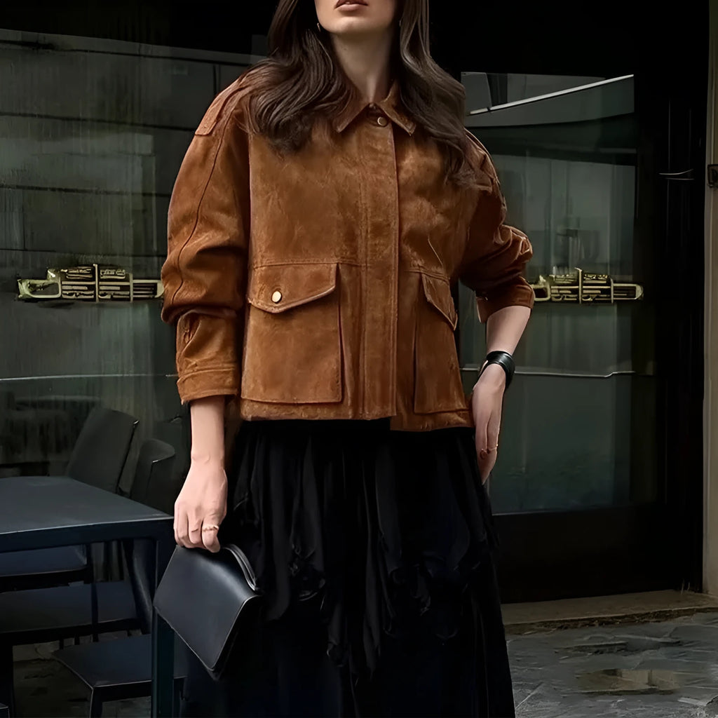 Women's brown suede coat with regular sleeves on hanger