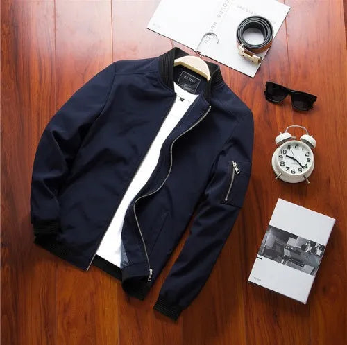 Men's slim fit casual jacket with a zipper front and side pockets in a solid colour.