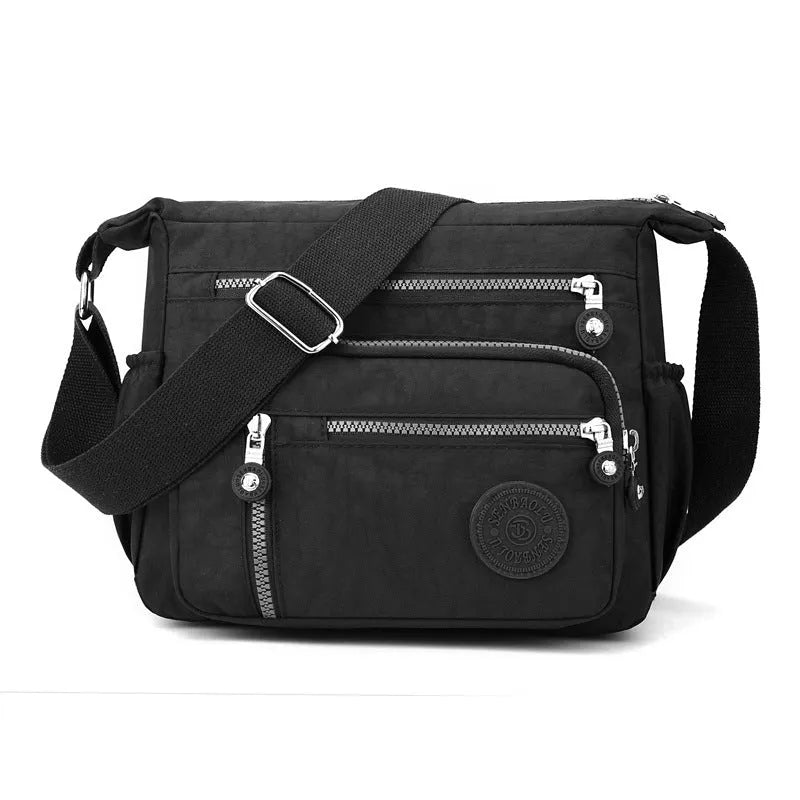 Soft nylon messenger bag with shoulder strap in square vertical shape