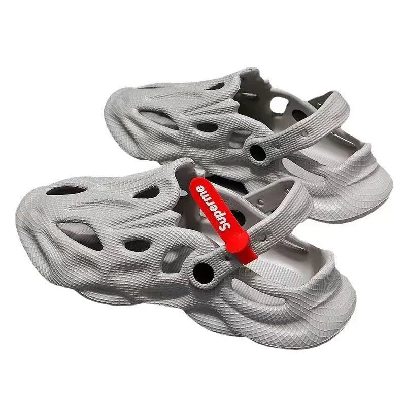 Pair of solid colour closed-toe EVA foam slippers on a neutral background, showing the frosted finish and thickened sole.