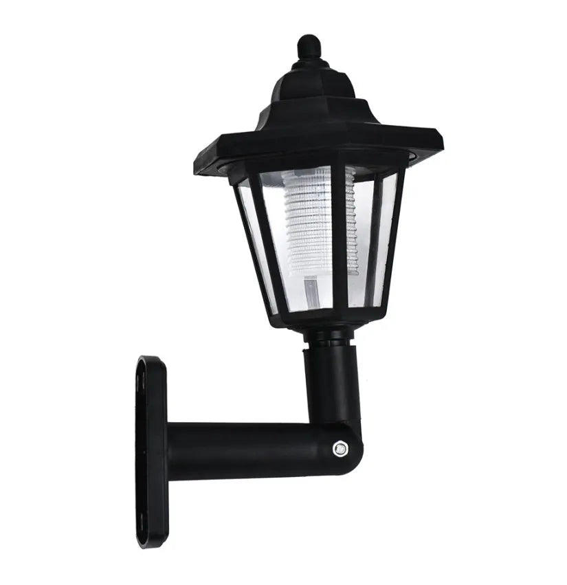 Black hexagonal solar wall lamp for outdoor garden or patio mounting