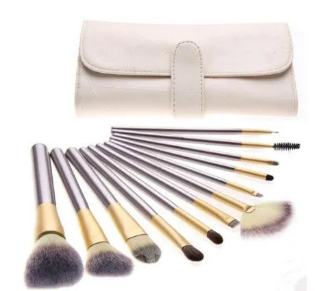Persian make-up brush set with rice white bristles and champagne colour metal handles, showing 12 brushes.