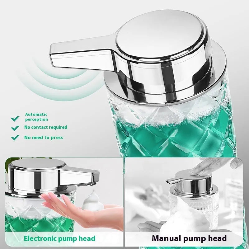 Silver automatic sensor soap dispenser with USB-C charging port on a bathroom counter.