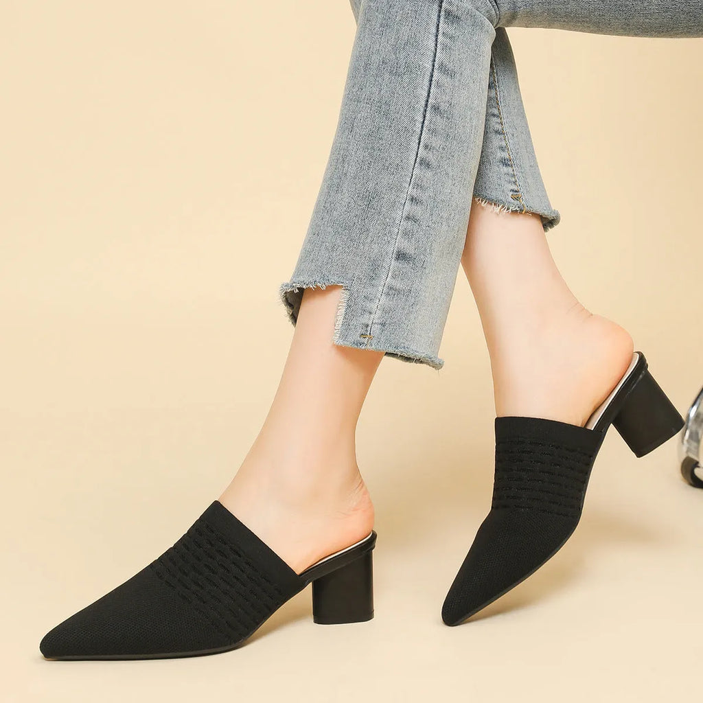 Women's pointed toe sandals with a fabric upper and 5cm chunky heel in fishing line colours.
