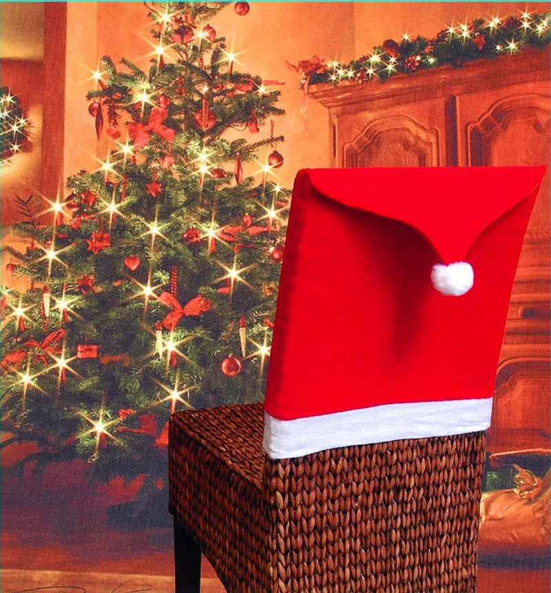 Set of red and white Christmas chair covers featuring Santa Claus, Snowman, and Santa hat designs on dining chairs.