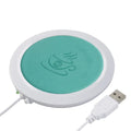 USB heating coaster in black, blue, and orange colours with insulated design