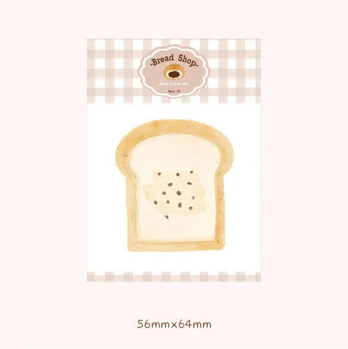 Food-shaped A5 notepad with bread, tomato, and yogurt designs, 85mm by 120mm.