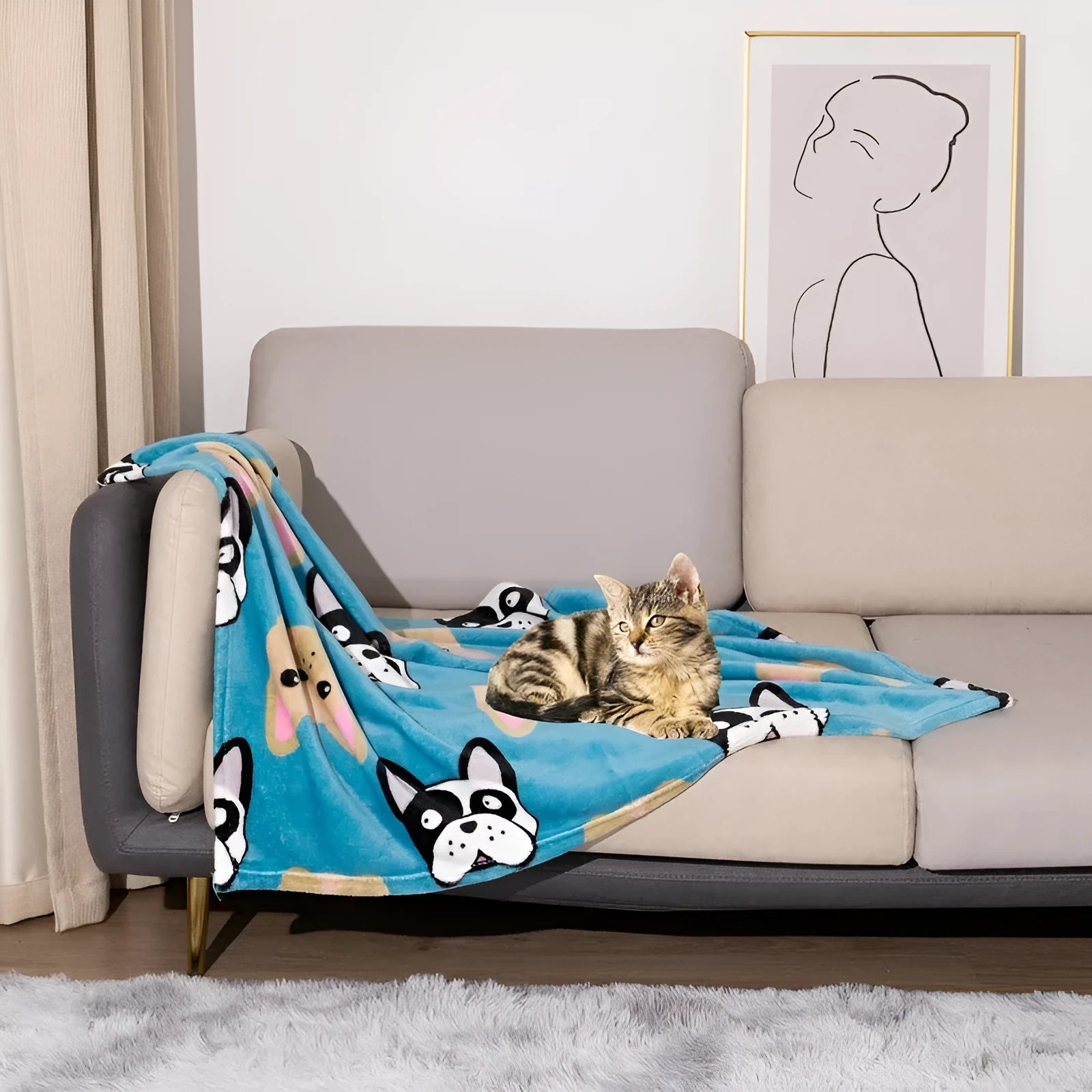 Blue cartoon dog print double-sided flannel pet blanket laid flat.