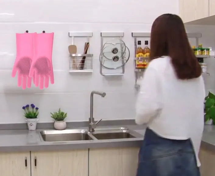 Blue silicone cleaning gloves with textured scrubbing surface on palms for washing dishes