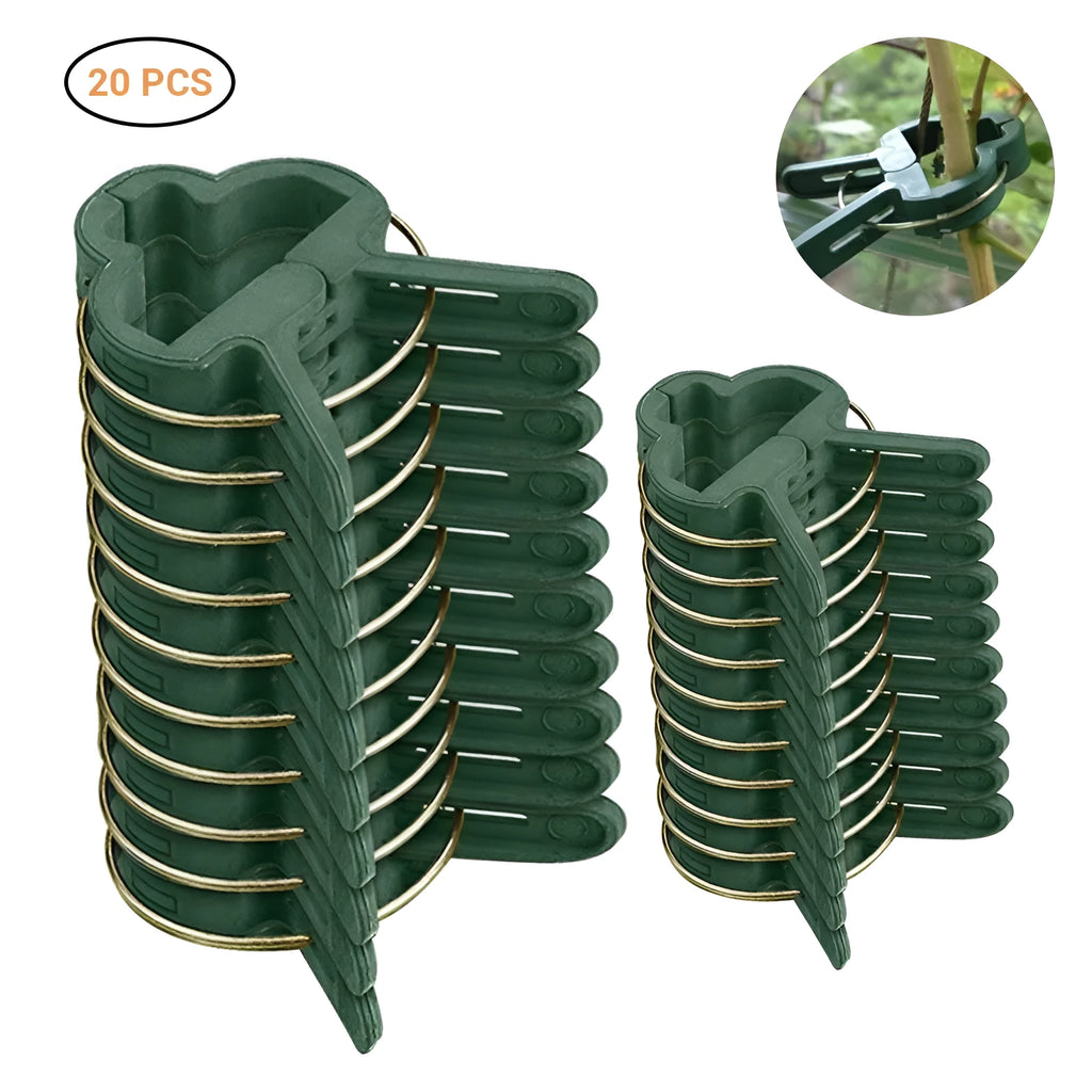 Green plastic plant fixing clips holding tomato vine to garden stake