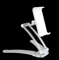 Silver aluminium alloy desktop stand holding a tablet, showing its adjustable clip and mounting base.