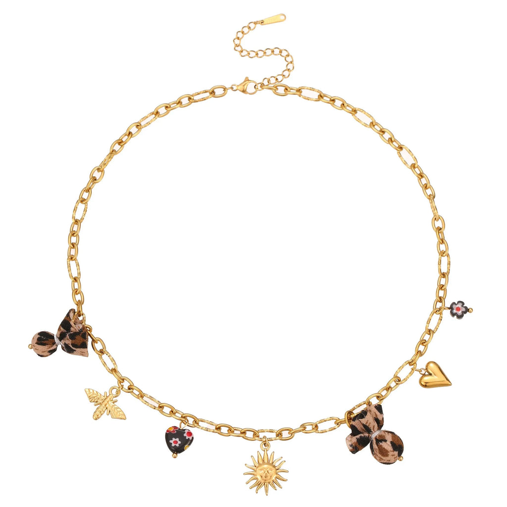 Stainless steel necklace with gold electroplated leopard pendant featuring love heart flowers on geometric design