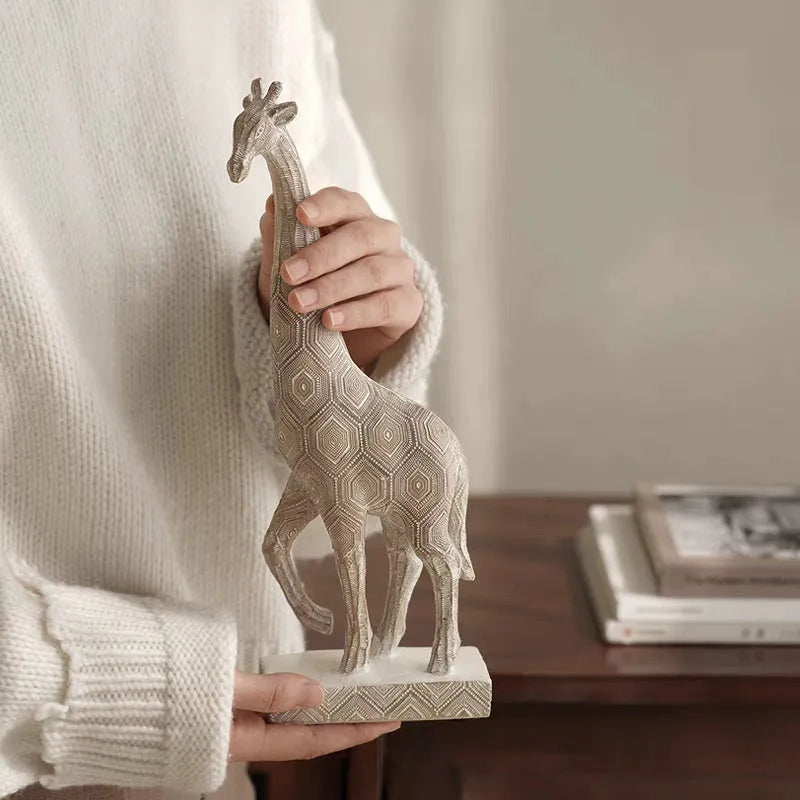 Wood colour European style giraffe resin ornament on a shelf for decorative display.
