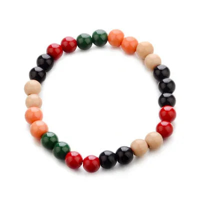 Natural stone lava bead bracelet with charms measuring 18cm in ethnic style