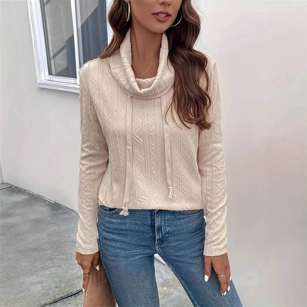Apricot coloured long sleeve hooded pullover sweater with drawstring adjustment