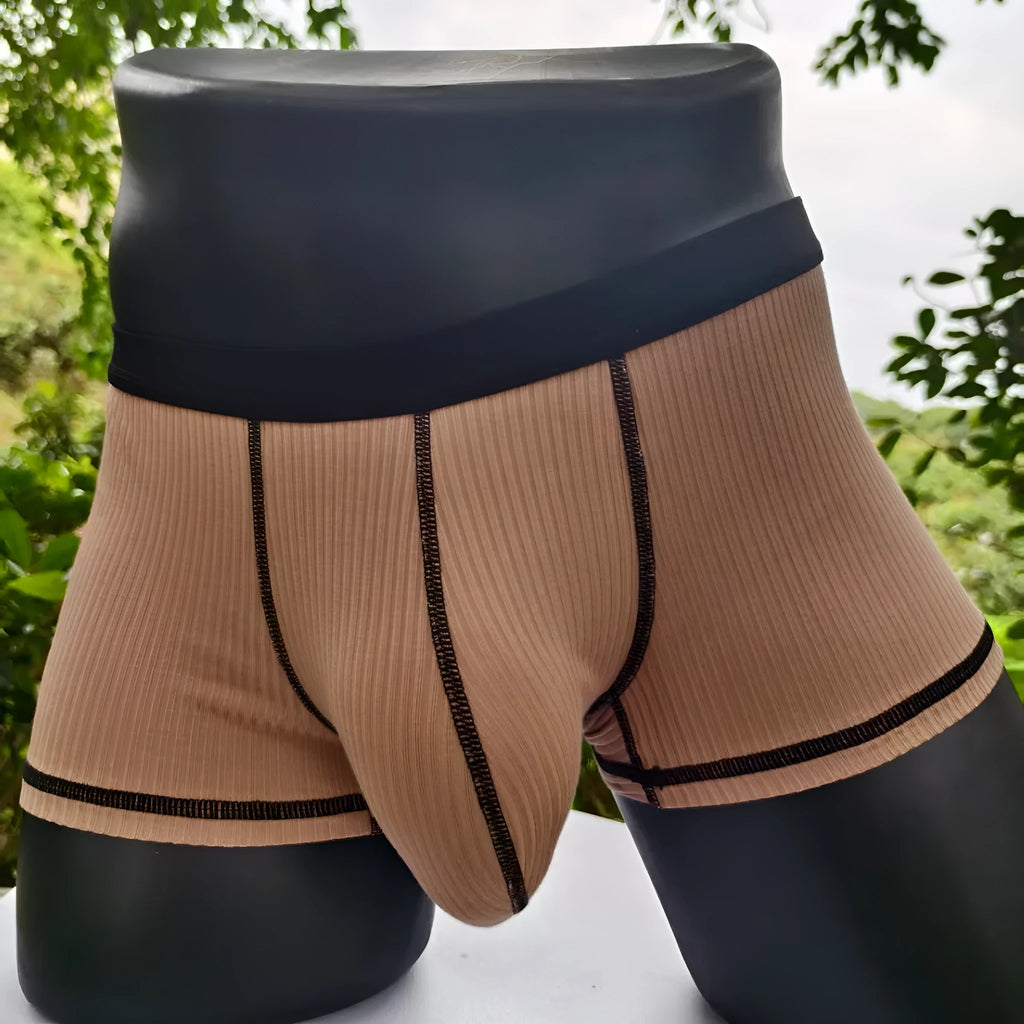 Men's solid colour boxers showing hip lifting and body shaping design in breathable fibre fabric