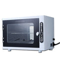 Small silver ultraviolet steriliser unit with stainless steel inner chamber for beauty tool sanitation.