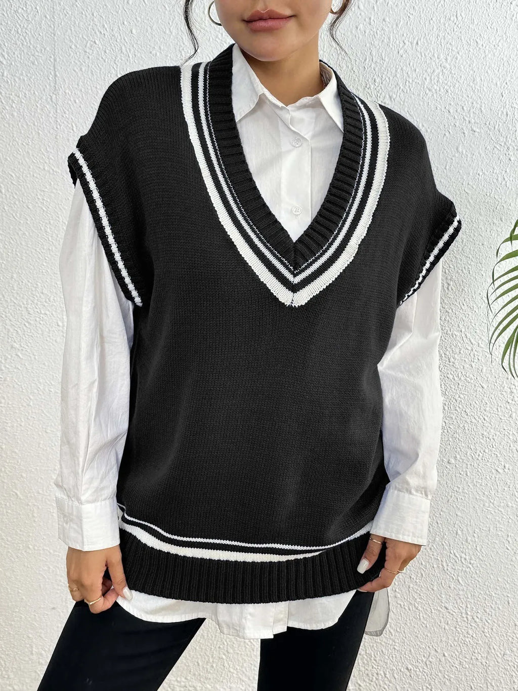 Women's casual loose-fit acrylic blend vest sweater in black, blue, or coffee colour.