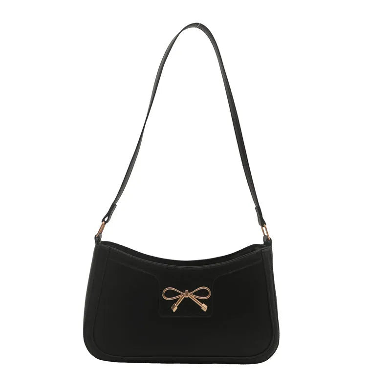 Western-style baguette shoulder bag in PU leather with bow detail, 24cm wide