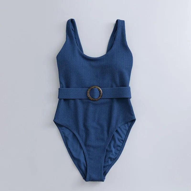 Navy blue women's one-piece slimming swimsuit with triangle design and chest pad.