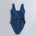 Navy blue women's one-piece slimming swimsuit with triangle design and chest pad.