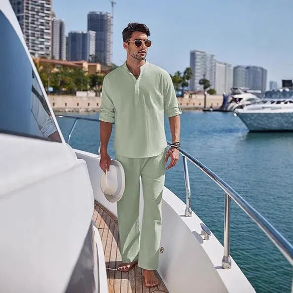 Men's solid colour casual cotton suit with long sleeves and trousers for spring and autumn leisure wear.