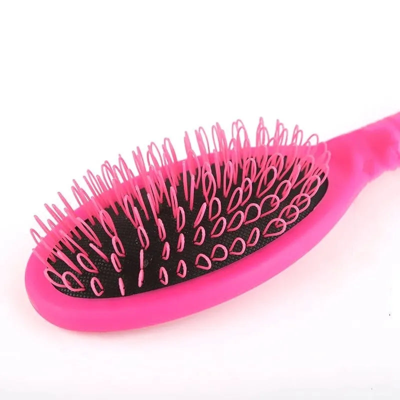 Black ring tooth hair extension comb made from ABS plastic measuring 22cm by 6cm
