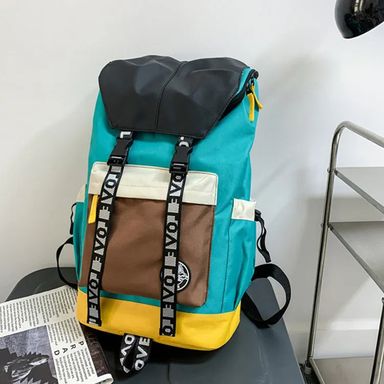 Oxford cloth backpack in black, green or red with 32cm width and 46cm height dimensions