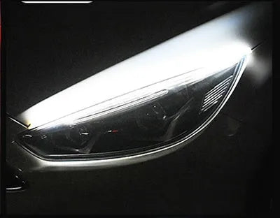 Car LED daytime running light strip with flowing turn signal in waterproof silicone, showing wire connections
