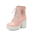Women's black thick-heeled short boots with front lace-up and round toe.