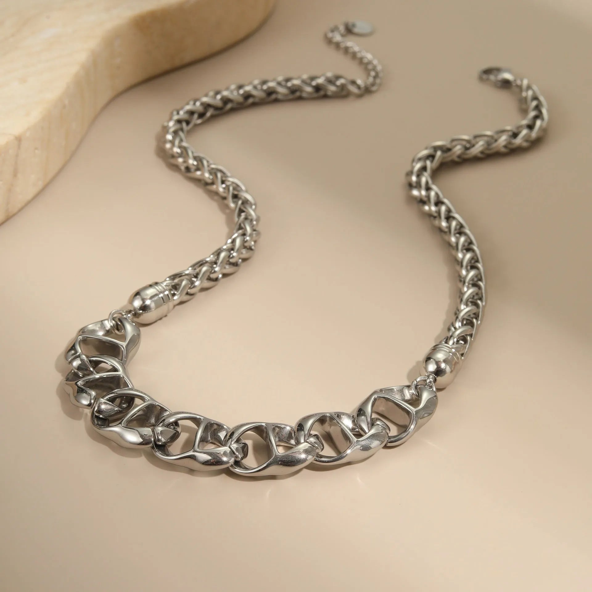 Gold plated stainless steel geometric pendant necklace for women on a chain.