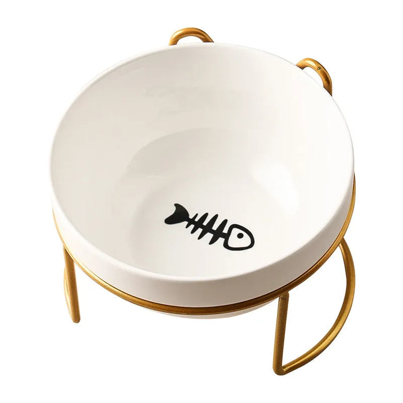 White ceramic cat bowl with decorative iron frame in cat footprints pattern