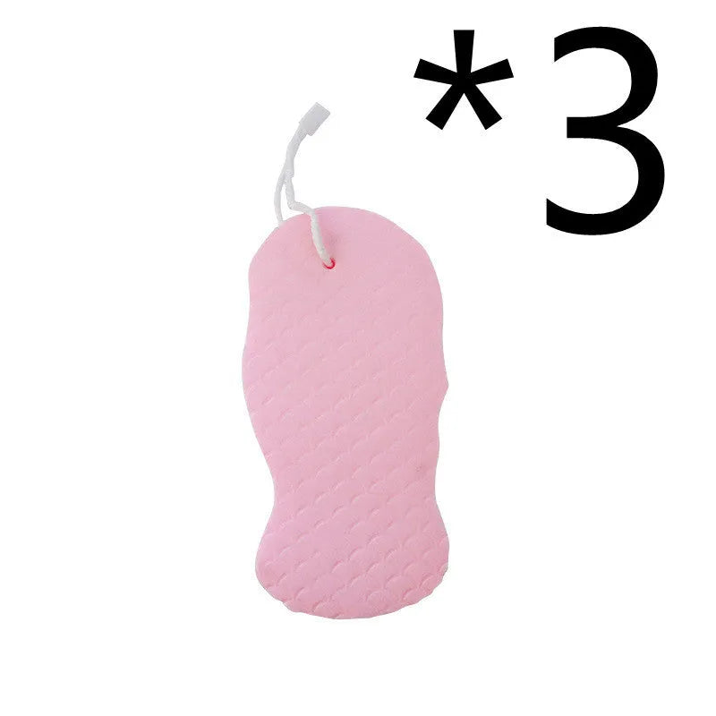 White 3D fish scale pattern bath sponge ball with hanging loop on a grey background.