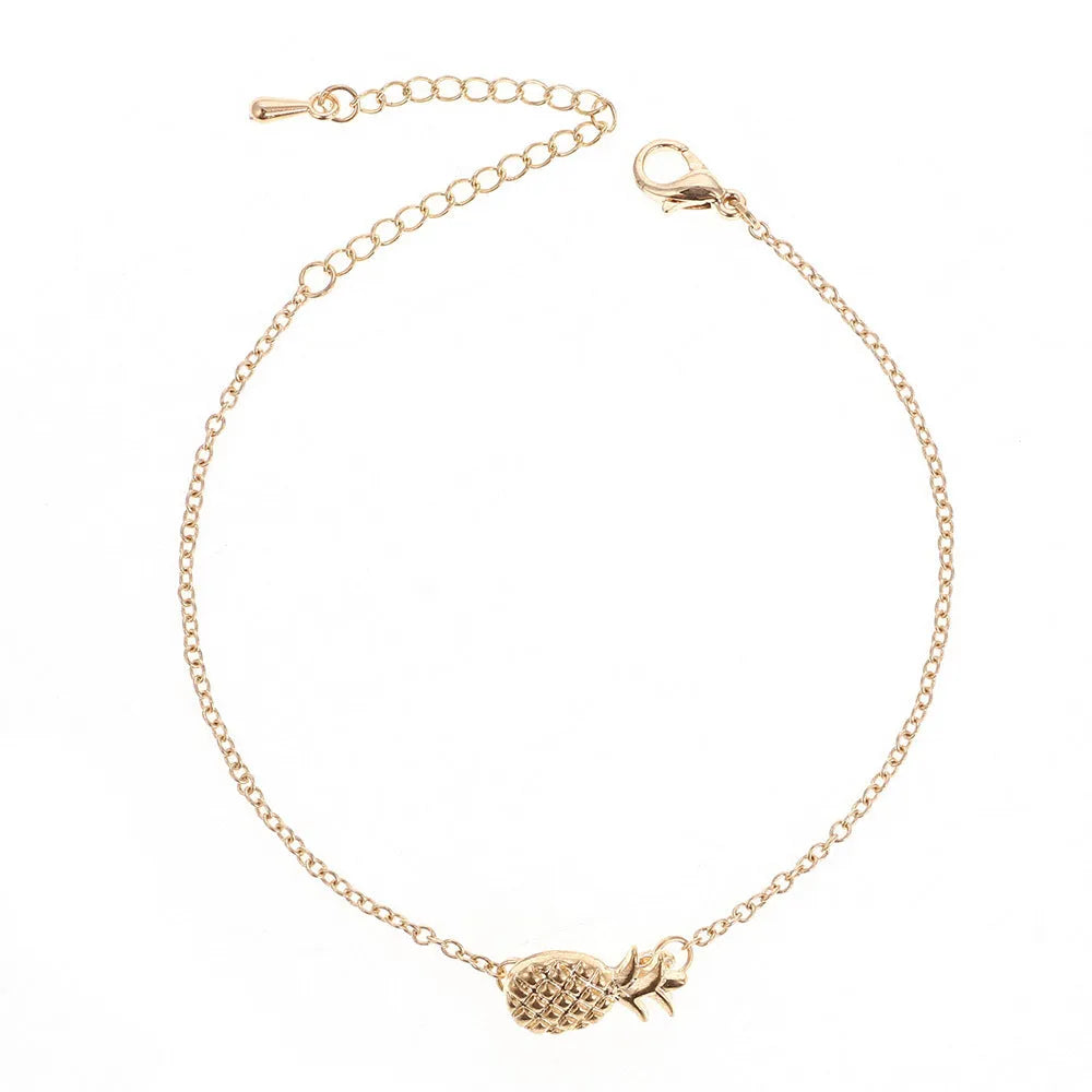 Women's alloy bracelet with pineapple fruit charm in gold or silver tone simple jewellery design