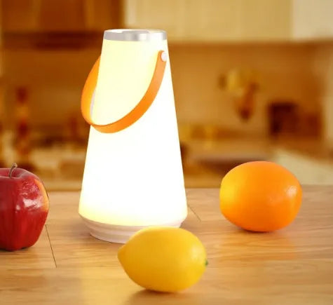 White rechargeable bedside table lamp with USB charging cable and touch control for adjustable brightness