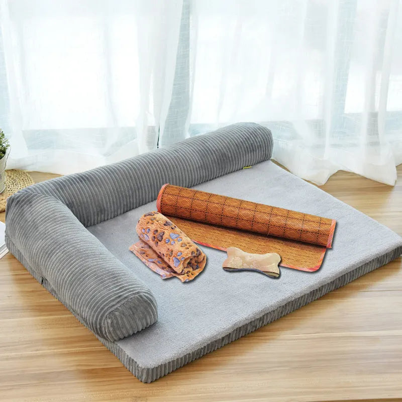 Corduroy pet sofa dog bed with bolster in grey colour, showing non-slip base and high-density sponge padding