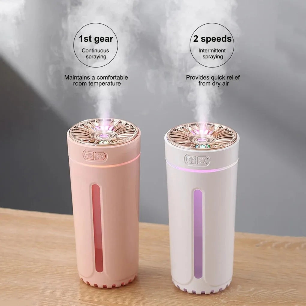 Black portable humidifier with LED lights showing dimensions and USB charging port