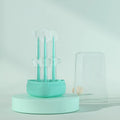 Purple silicone toothbrush for cleaning dog and cat teeth.