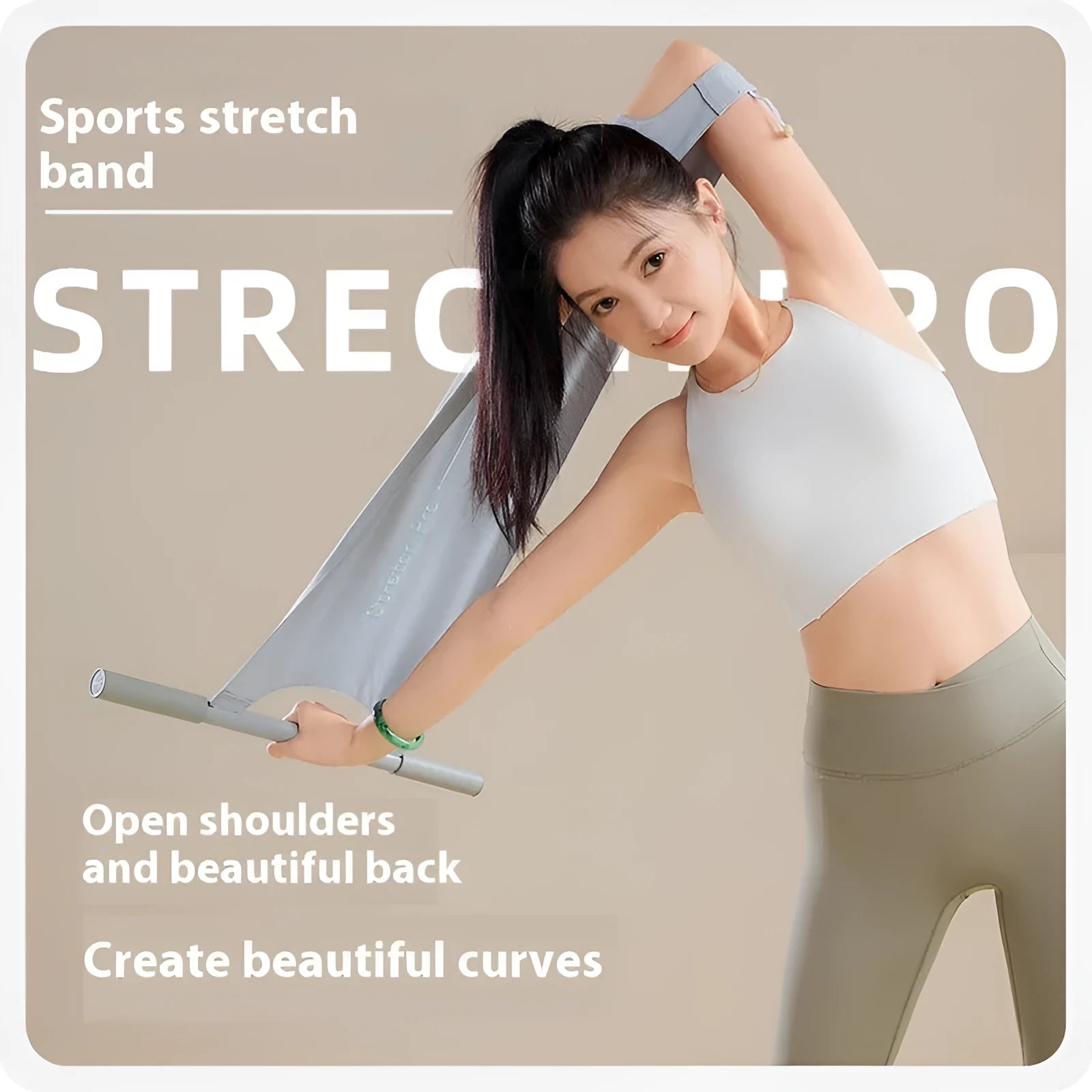 Grey and pink yoga stretching tool for shoulder, back, and hip flexibility exercises.