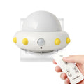 Remote control UFO shaped bedside night light in blue, pink, or white colour options.