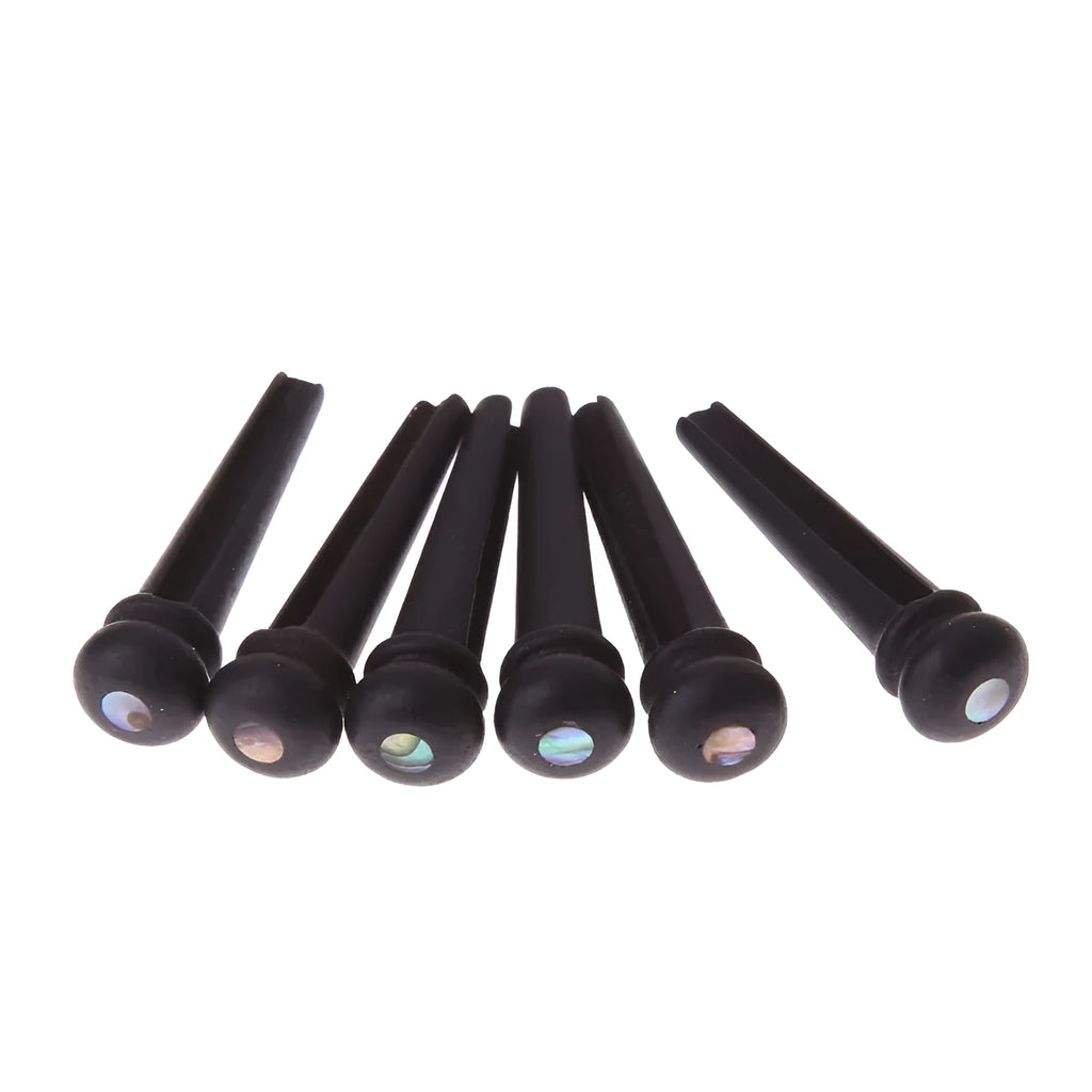 Six ebony folk guitar string nails with 5.3mm bayonet diameter and matt black finish