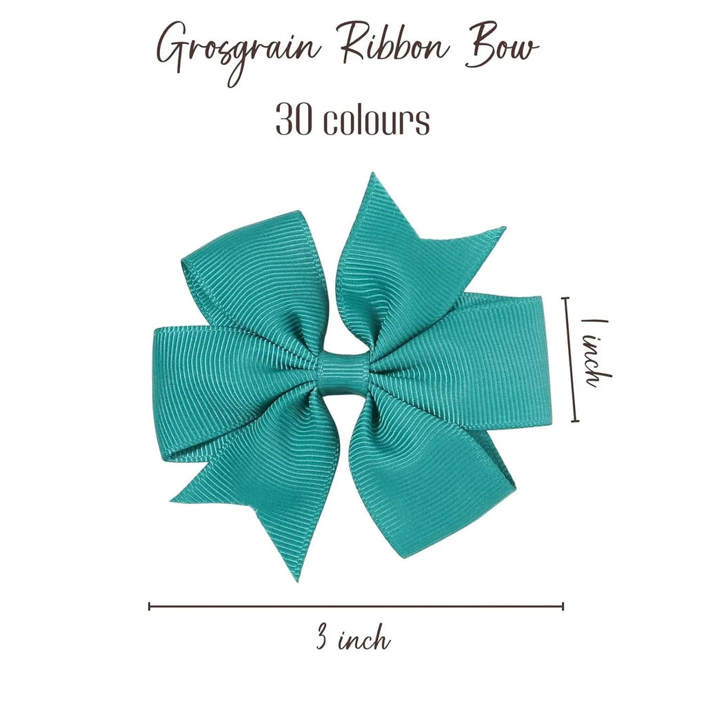 Assorted colour 3-inch grosgrain ribbon hair bows on alligator clips for toddler girls.