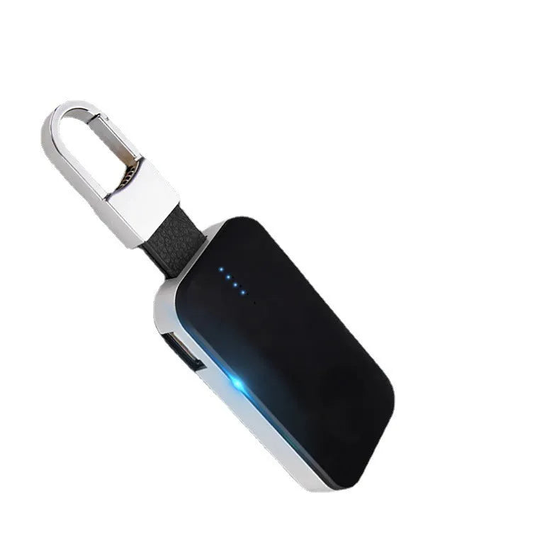 Black Apple Watch wireless power bank charger with keychain attachment showing dimensions