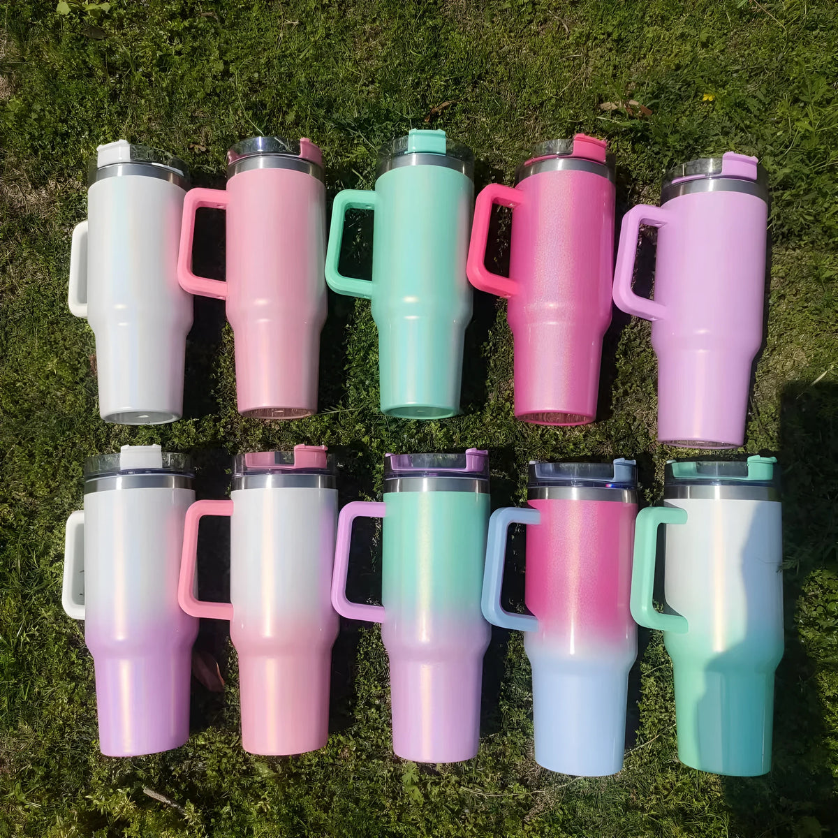 Large stainless steel vacuum insulation cup with gradient colours showing thermal insulation design