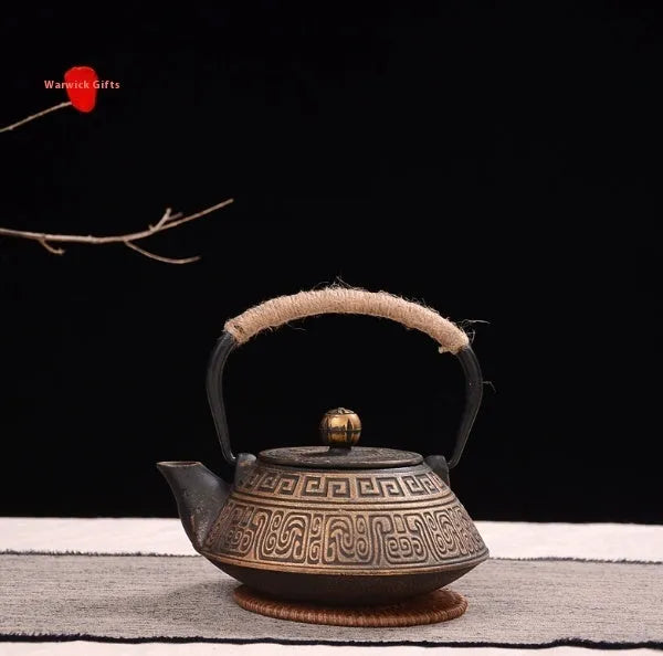 0.9L cast iron teapot with Japanese-style fish pattern in bronze finish