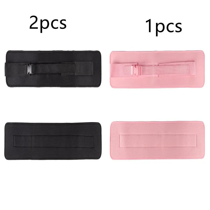 Black or pink fitness auxiliary strap for lumbar support during dumbbell barbell hip bridge exercises.