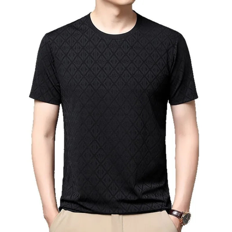 Man wearing a loose fit black Jacquard short sleeve T-shirt with a round neckline.