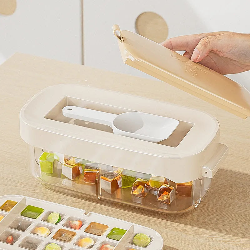 Food-grade plastic high capacity ice cube tray with grid and stored ice shovel in blue colour.