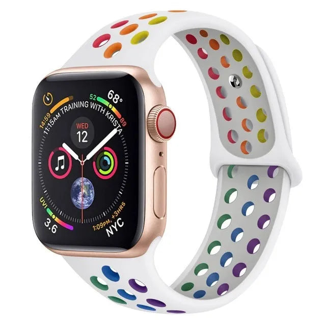 Adjustable silicone sports wristband in black, white, or rainbow colours with a single buckle.