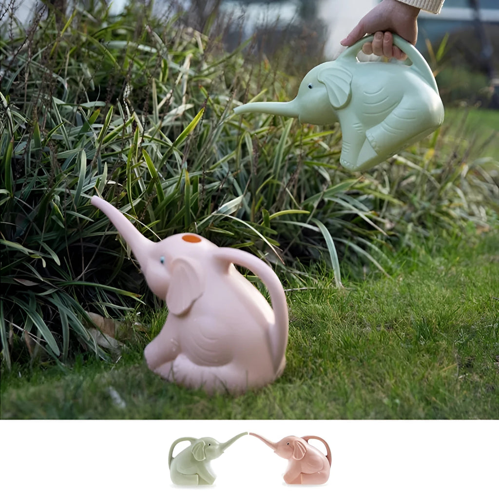 Pink baby elephant-shaped watering can with a long spout and baby bottle handle on a table.